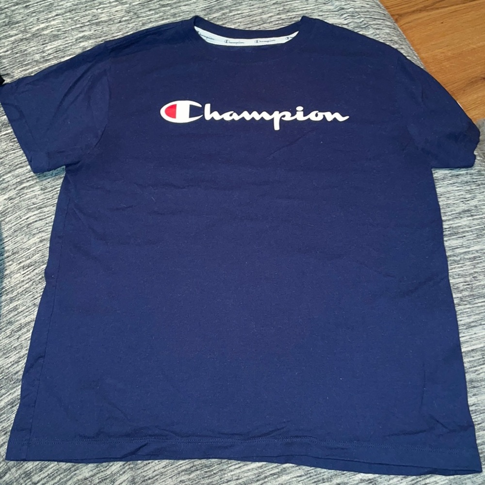 navy blue champion shirt, size medium
